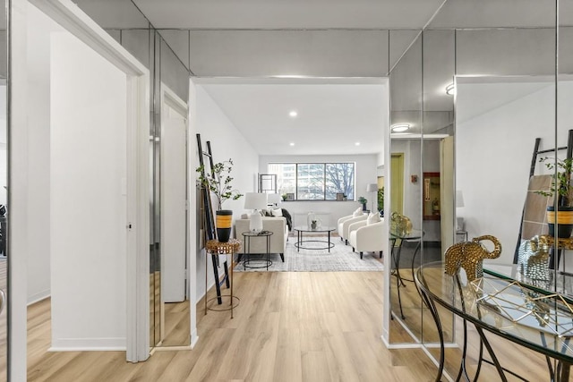 hall with light wood-type flooring