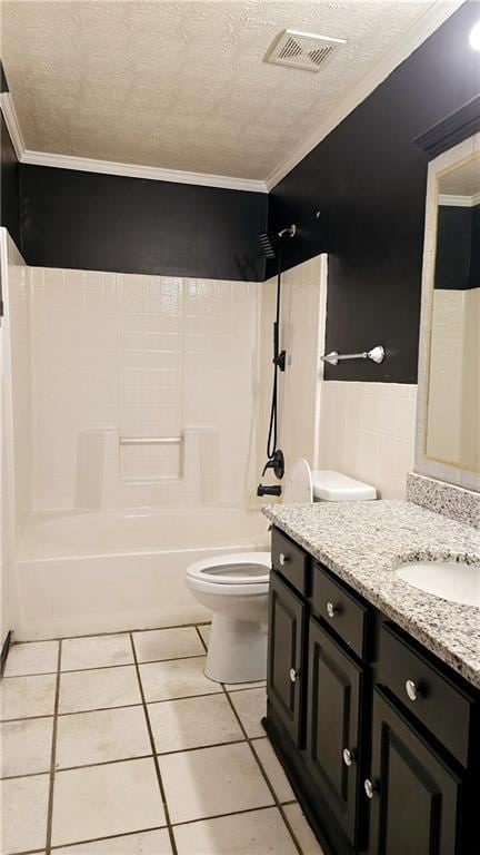 full bathroom with shower / washtub combination, vanity, toilet, tile patterned floors, and a textured ceiling