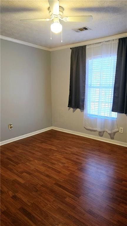 unfurnished room with crown molding, a textured ceiling, ceiling fan, and dark hardwood / wood-style flooring