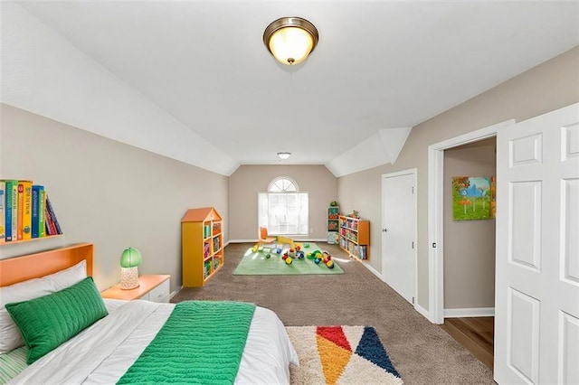 playroom featuring lofted ceiling