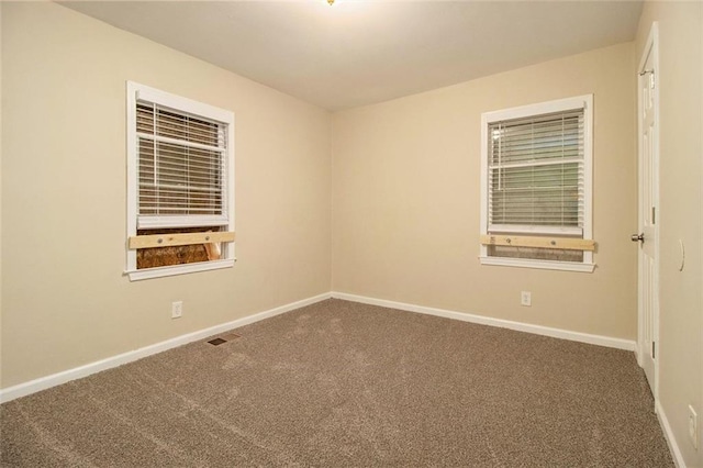 1907 Oak Valley Rd, Decatur, GA 30035 - spare room with carpet floors, visible vents, and baseboards