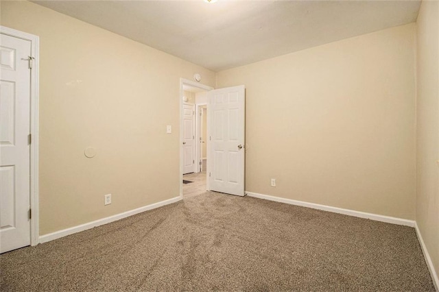 1907 Oak Valley Rd, Decatur, GA 30035 - carpeted empty room featuring baseboards