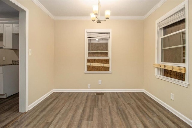 1907 Oak Valley Rd, Decatur, GA 30035 - unfurnished dining area with visible vents, wood finished floors, baseboards, and crown molding