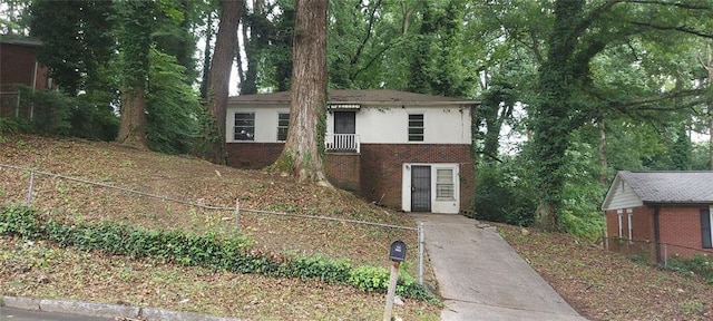 2980 Wanda Cir SW, Atlanta, GA 30315 - view of front of house featuring brick siding, driveway, and stucco siding