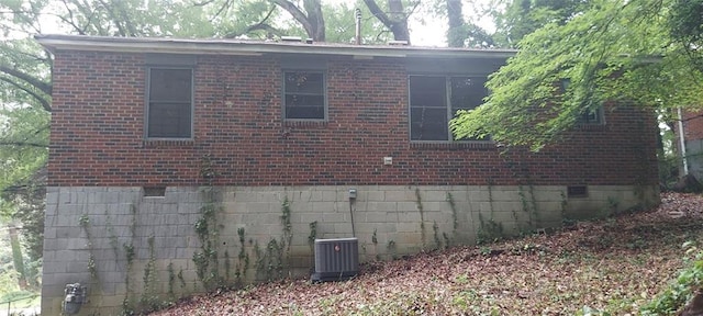 2980 Wanda Cir SW, Atlanta, GA 30315 - view of property exterior featuring brick siding, central air condition unit, and crawl space
