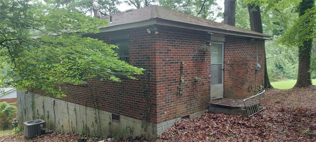 2980 Wanda Cir SW, Atlanta, GA 30315 - view of side of property featuring brick siding and central AC unit