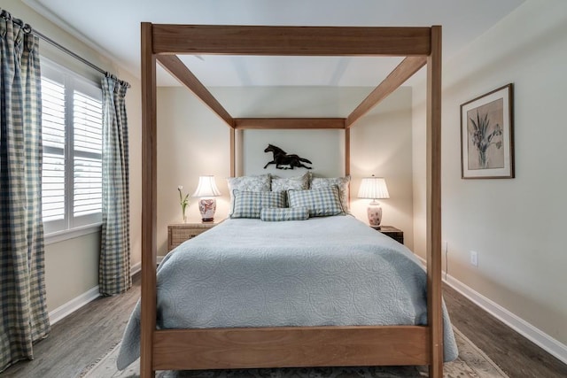 bedroom featuring wood-type flooring