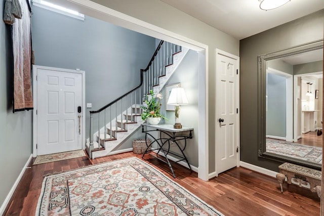 entrance foyer featuring dark hardwood / wood-style flooring