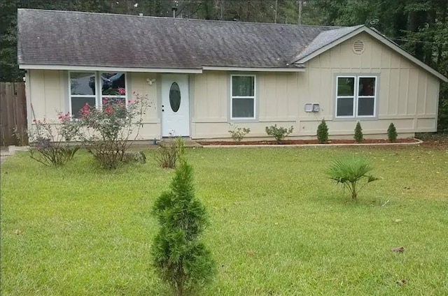 ranch-style house with a front yard