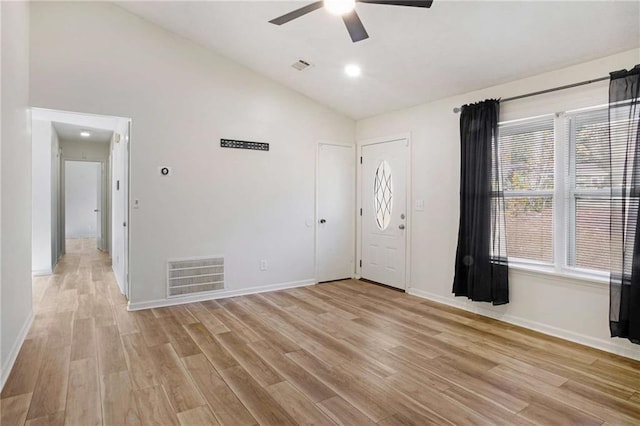 foyer featuring light hardwood / wood-style flooring, ceiling fan, and lofted ceiling