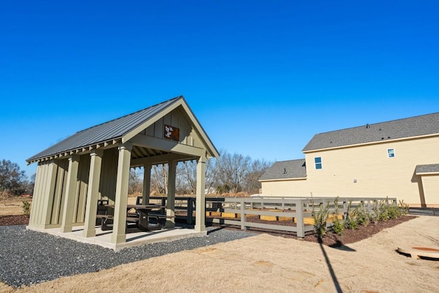 surrounding community with a gazebo and a patio