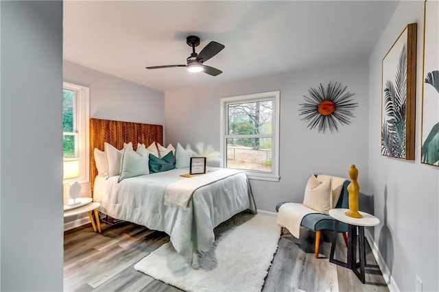 2162 Westover Dr, Atlanta, GA 30344 - bedroom with wood finished floors, baseboards, and ceiling fan