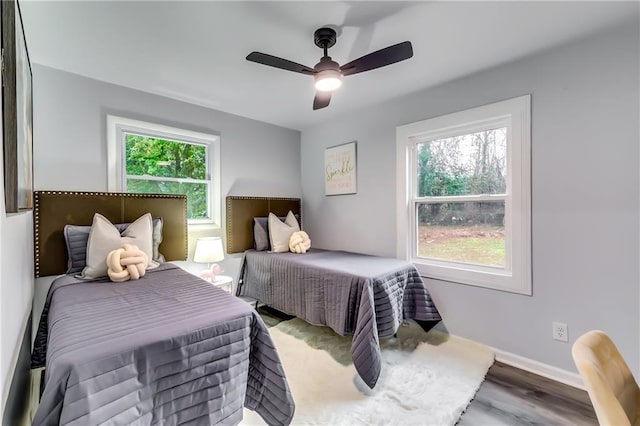 2162 Westover Dr, Atlanta, GA 30344 - bedroom with wood finished floors, ceiling fan, and baseboards