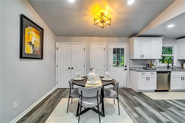 2162 Westover Dr, Atlanta, GA 30344 - dining room with plenty of natural light, dark wood-style flooring, baseboards, a chandelier, and recessed lighting