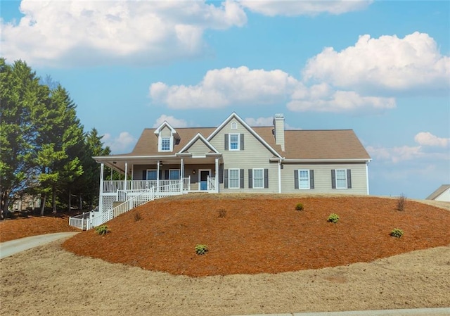 view of front of property featuring covered porch