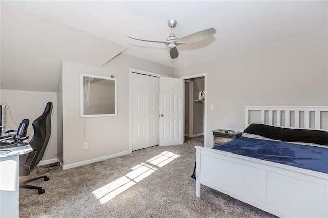 bedroom with a ceiling fan, a closet, carpet flooring, and baseboards