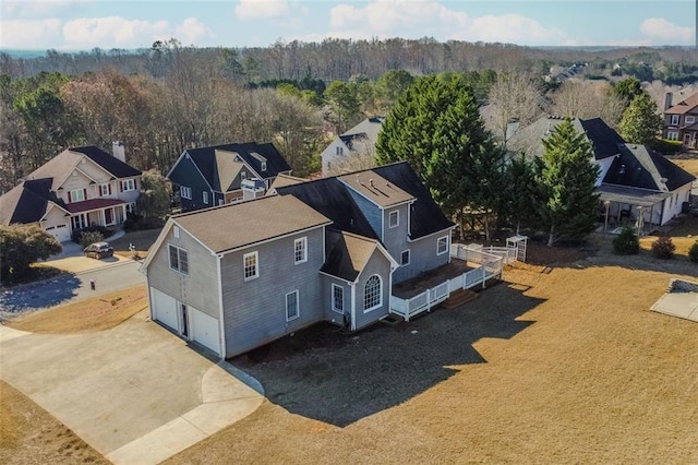 birds eye view of property with a residential view