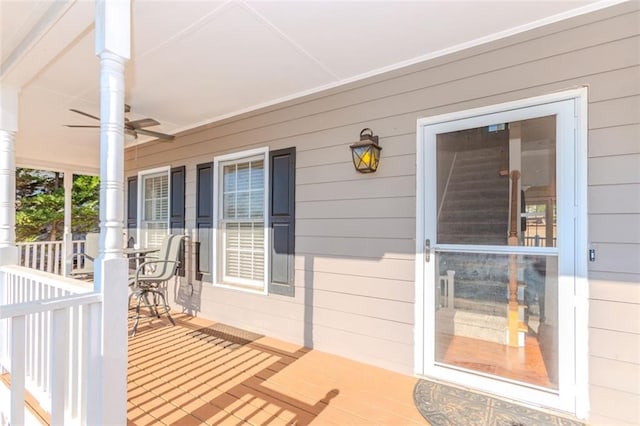 exterior space featuring covered porch and ceiling fan