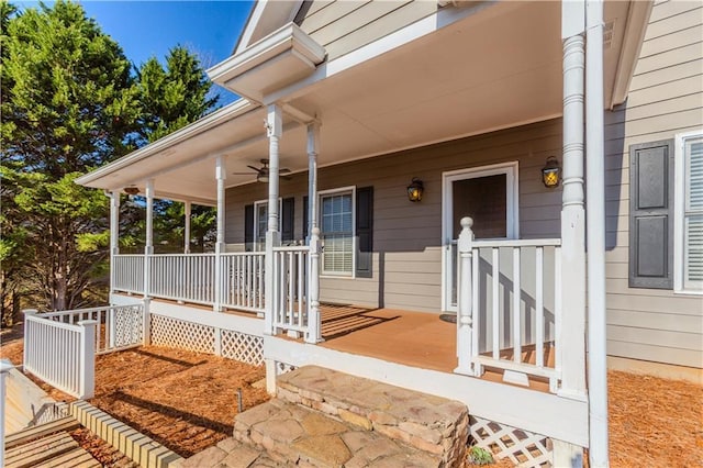 property entrance featuring a porch and ceiling fan