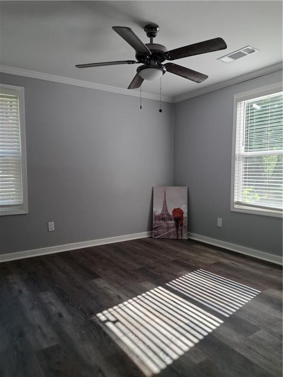 1290 Elizabeth Ave, Atlanta, GA 30310 - empty room featuring crown molding, visible vents, wood finished floors, baseboards, and a ceiling fan
