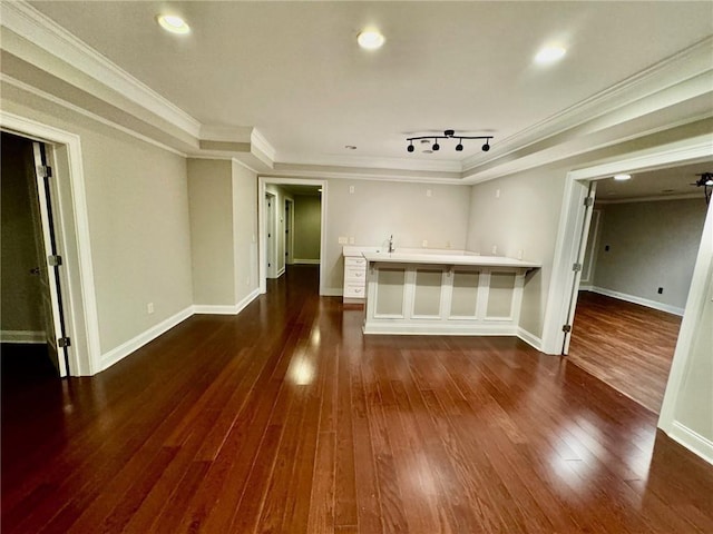 2822 Salem Oak Way, Duluth, GA 30096 - unfurnished living room featuring crown molding, dark wood-style flooring, baseboards, recessed lighting, and track lighting