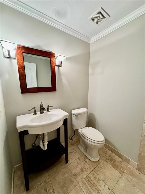 2822 Salem Oak Way, Duluth, GA 30096 - bathroom featuring toilet, ornamental molding, baseboards, a sink, and tile patterned floors