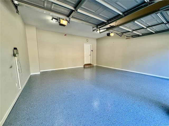 2822 Salem Oak Way, Duluth, GA 30096 - garage featuring a garage door opener and baseboards