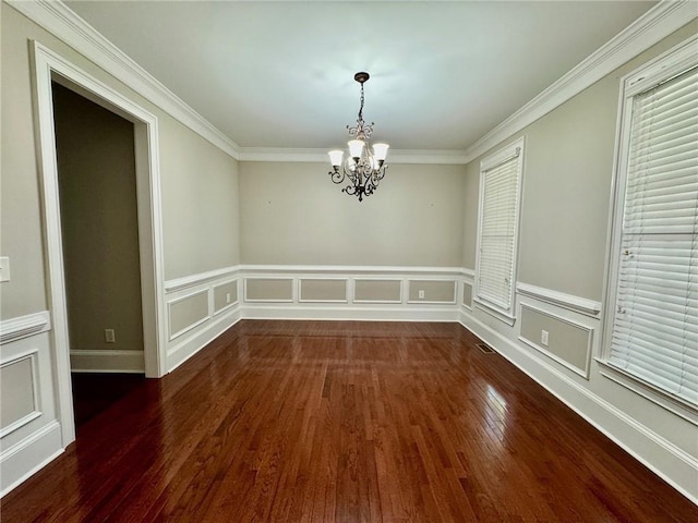 2822 Salem Oak Way, Duluth, GA 30096 - spare room with a chandelier, wood finished floors, ornamental molding, wainscoting, and a decorative wall