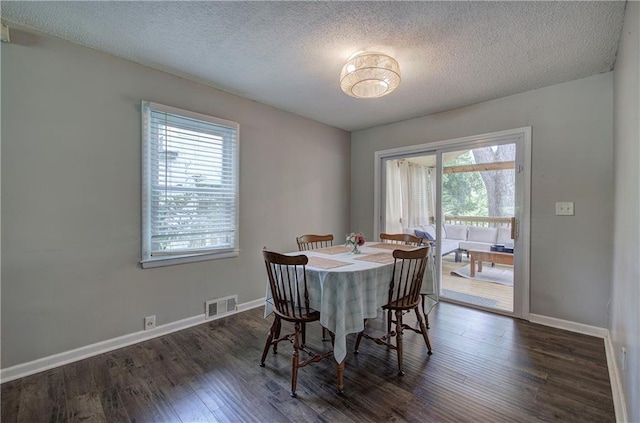 1837 Lochlomand Ln SE, Smyrna, GA 30080 - dining space featuring wood finished floors, a textured ceiling, and baseboards