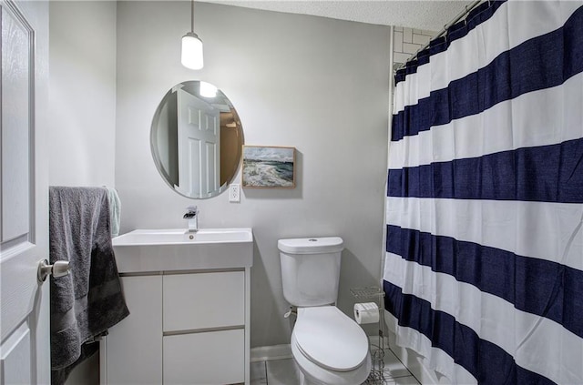 1837 Lochlomand Ln SE, Smyrna, GA 30080 - full bathroom featuring toilet, vanity, a shower with shower curtain, tile patterned floors, and baseboards