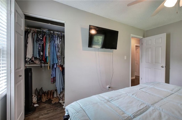 1837 Lochlomand Ln SE, Smyrna, GA 30080 - bedroom featuring wood finished floors, a closet, a textured ceiling, and a ceiling fan