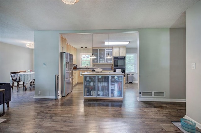 1837 Lochlomand Ln SE, Smyrna, GA 30080 - kitchen featuring stainless steel refrigerator with ice dispenser, baseboards, dark wood finished floors, and a textured ceiling