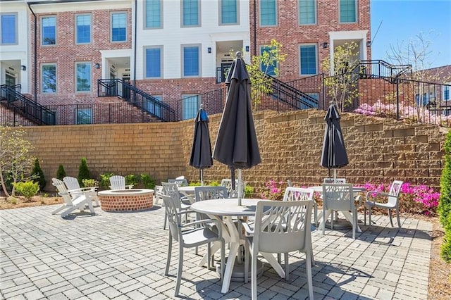 view of patio / terrace featuring a fire pit