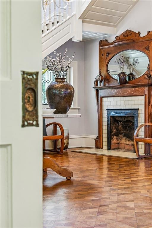 sitting room featuring wood finished floors and a fireplace