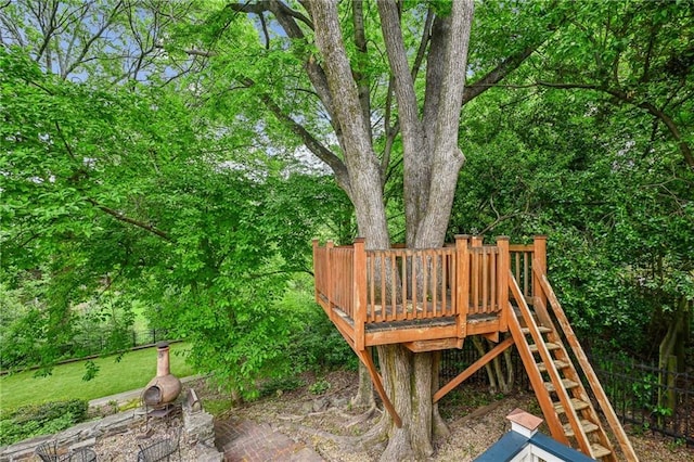 view of jungle gym featuring a wooden deck