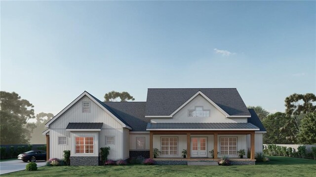 312 Oak Trce E, Jasper, GA 30143 - modern farmhouse with board and batten siding, a front yard, a standing seam roof, and a porch