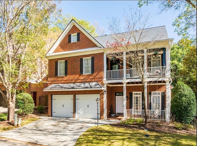 view of front facade featuring covered porch and a garage