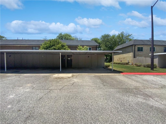 view of front of house featuring a carport