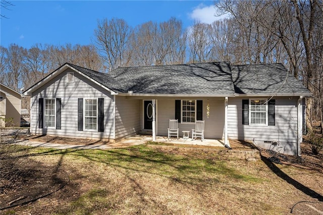 single story home with a porch, crawl space, roof with shingles, and a front lawn