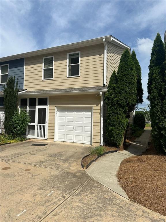 view of property with a garage