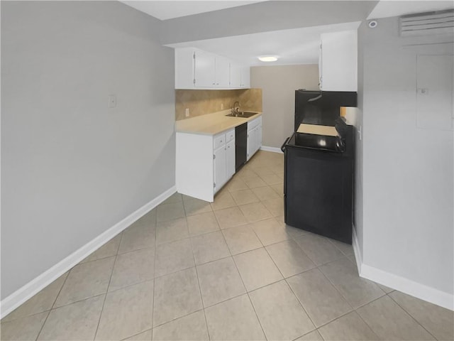 3541 Old Chamblee Tucker Rd Unit G, Atlanta, GA 30340 - kitchen with a sink, light tile patterned floors, light countertops, baseboards, and dishwasher