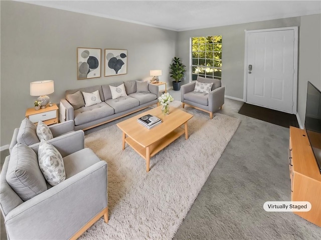 3541 Old Chamblee Tucker Rd Unit G, Atlanta, GA 30340 - living room featuring baseboards, crown molding, and carpet