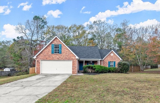 view of property with a front yard and a garage