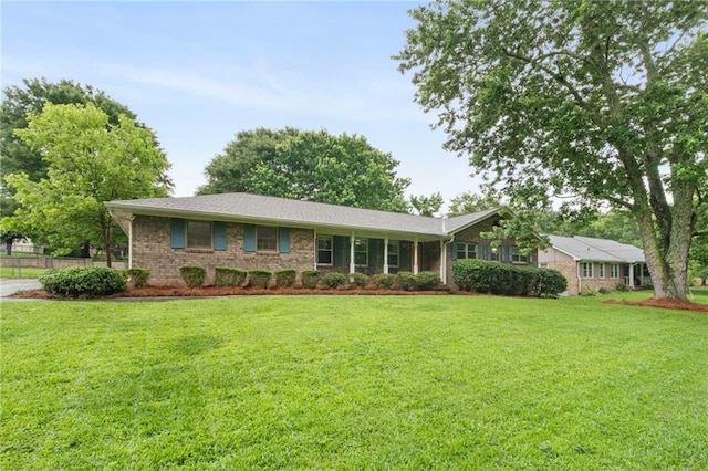 2644 Hickory Valley Dr, Snellville, GA 30078 - single story home with a front yard and brick siding