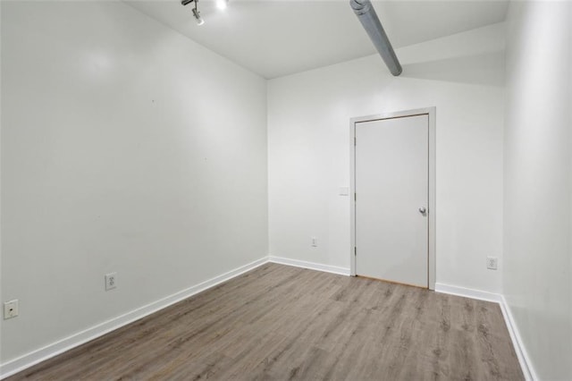 unfurnished room featuring light hardwood / wood-style flooring