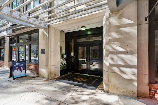 entrance to property featuring french doors