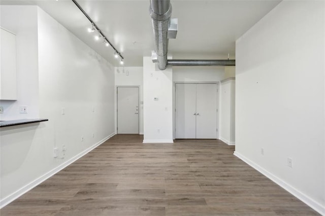 interior space with hardwood / wood-style flooring