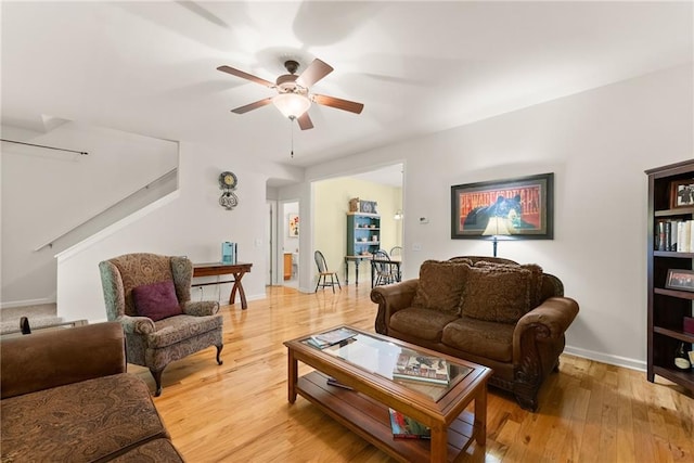 127 Walkabout Way, Dahlonega, GA 30533 - living area featuring a ceiling fan, stairway, and light wood-type flooring