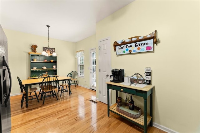 127 Walkabout Way, Dahlonega, GA 30533 - dining space featuring light wood-type flooring and baseboards
