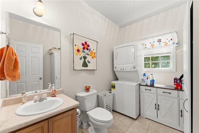 127 Walkabout Way, Dahlonega, GA 30533 - bathroom featuring stacked washer / drying machine, vanity, and tile patterned flooring